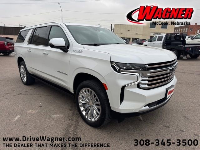 2024 Chevrolet Suburban High Country in Iridescent Pearl Tricoat — front three-quarter view