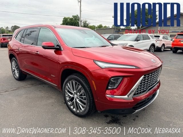 2026 Buick Enclave Avenir in Cherry Red Tintcoat — front three-quarter view