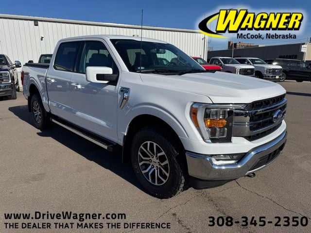 2022 Ford F-150 Lariat in Oxford White — front three-quarter view