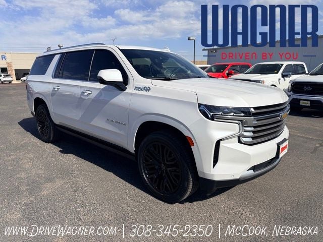 2021 Chevrolet Suburban High Country in Iridescent Pearl Tricoat — front three-quarter view