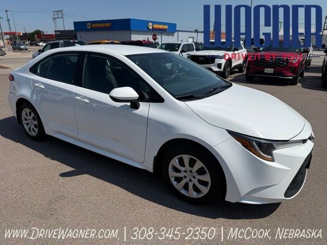 2022 Toyota Corolla LE in White — front three-quarter view